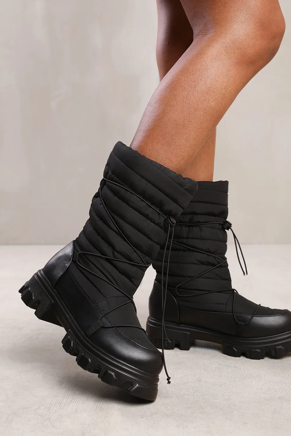 ROSIE PUFFER QUILTED BOOT WITH CHUNKY SOLES IN BLACK